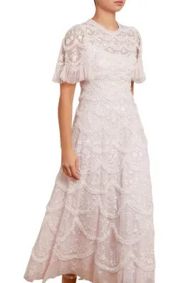 Elegant Blush Ruffled Gown with Lily Bloom Embellishments