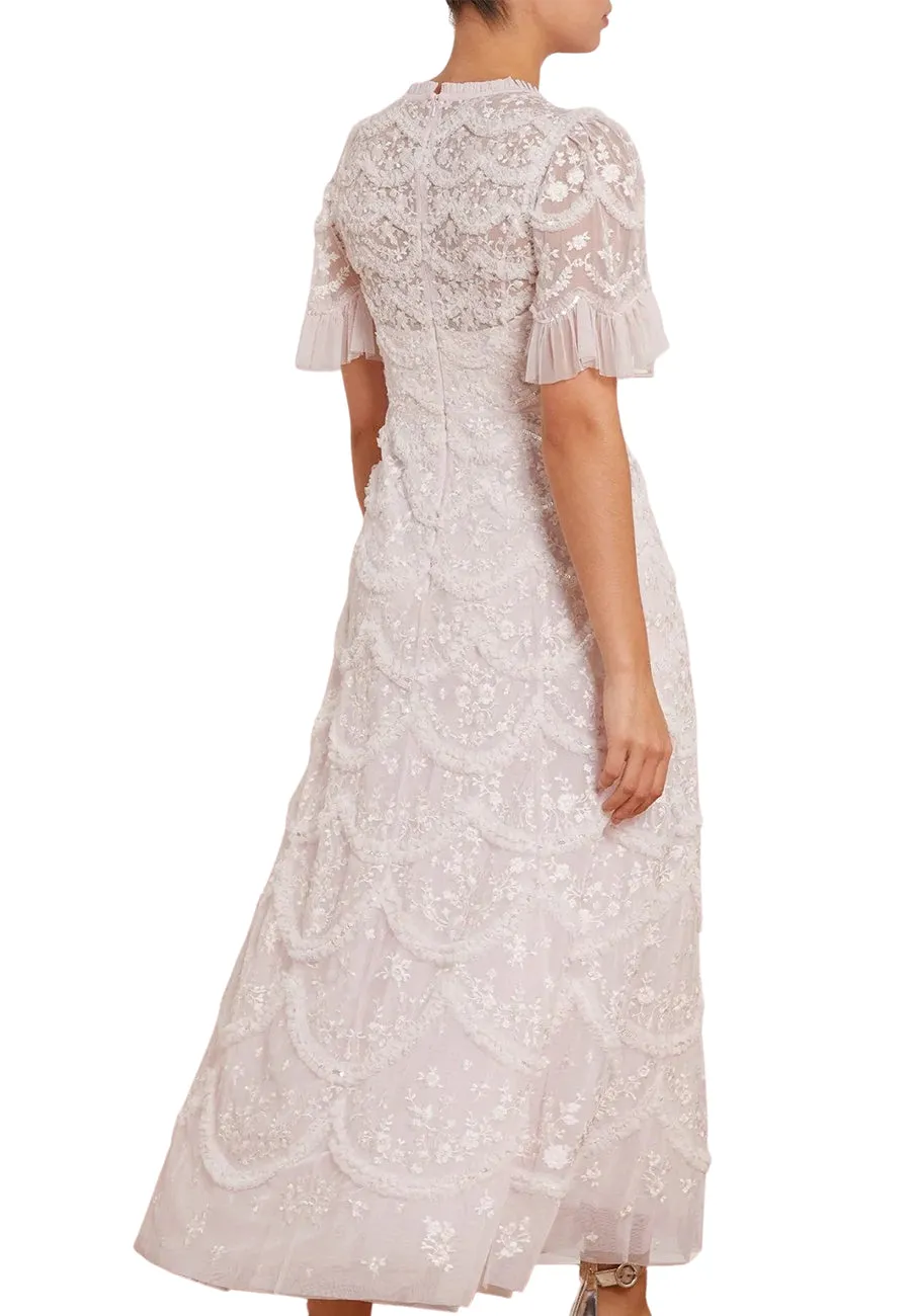 Elegant Blush Ruffled Gown with Lily Bloom Embellishments
